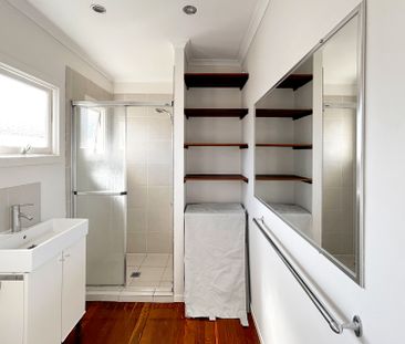 Relaxed beachside living with elevated ocean outlooks - Periodic Lease - Photo 1