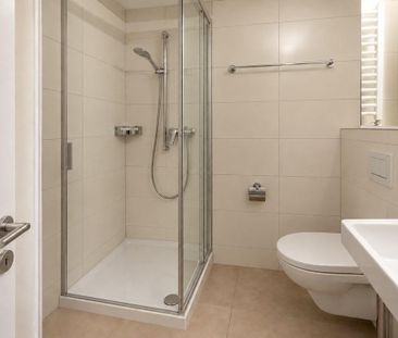 Moderne 1-Zimmer-Wohnung mit eigenem Aussensitzplatz - Foto 3