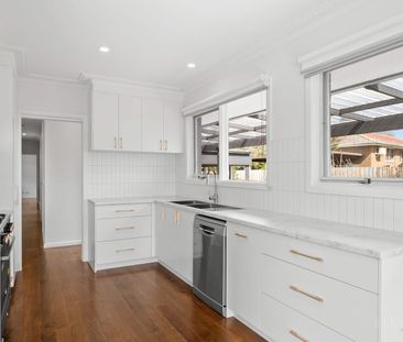 Beautifully Renovated with Unrivalled Six-Car Garaging - Photo 6