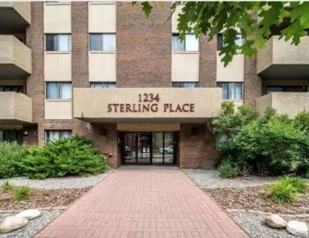 Spacious 1-Bedroom Condo with Patio, Laundry & FREE Parking | 1234 14 Ave SW, Calgary - Photo 1