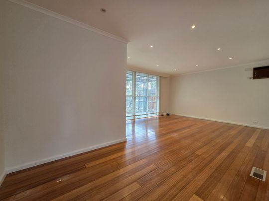 Freshly Painted, Perfectly Positioned Three Bedroom! - Photo 1