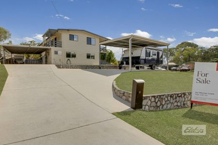 THIS PROPERTY OFFERS LOW MAINTENANCE LIVING WITH A SPACIOUS YARD , PRACTICAL LAYOUT AND SOLAR! - Photo 5