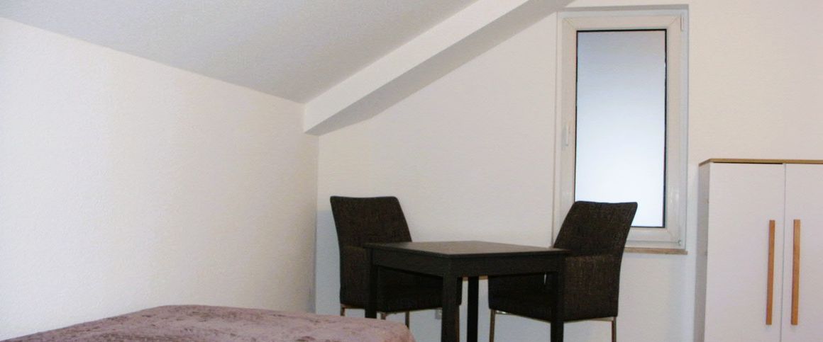 Sutthausen, modernes Apartment mit WohnSchlafraum und integrierter kl. Einbauküche. - Foto 1