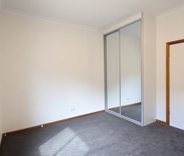 Modern Comfort Meets Family-Friendly Living - Photo 6