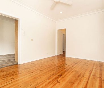 Charming Family Home with Modern Comforts - Photo 1