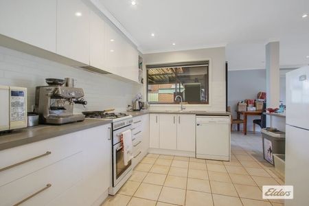 3-Bedroom Retreat With Extra Storage - Photo 2