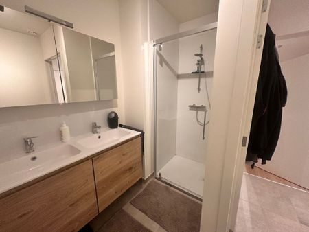 Energiezuinig nieuwbouwappartement (label A) met zonnig terras en overdekte parking! - Photo 5