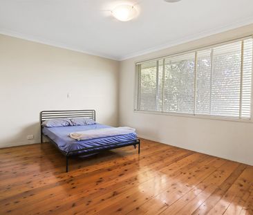 SINGLE STORY BRICK HOME IN A BLUE-RIBBON LOCATION - Photo 4