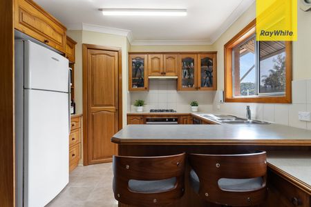 Spacious High-Set Brick Home with Pool & Entertaining - Photo 3