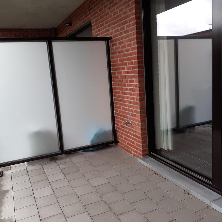 Modern gelijkvloers appartement in het centrum met tuin - Foto 1