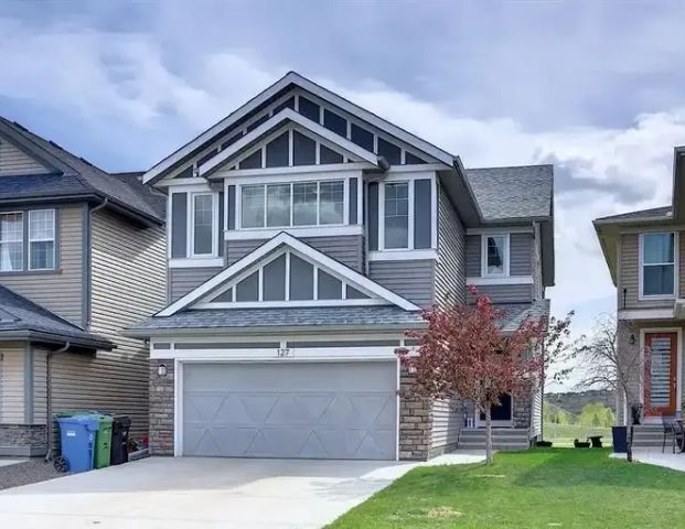 Stunning Home Overlooking Blue Devil Golf Course – A Perfect Retreat! | 127 Chaparral Valley Way Southeast, Calgary - Photo 1