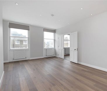 A spacious three double bedroom flat set over two floors with high ... - Photo 1