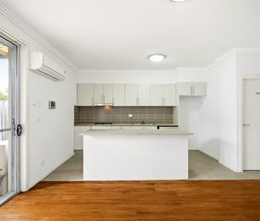 Good Size Townhouse With Fresh Updates Throughout! - Photo 1