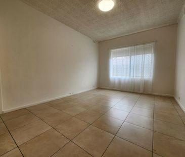 DOWNSTAIRS UNIT. SECURE AND IN A VERY CONVENIENT LOCATION - Photo 2
