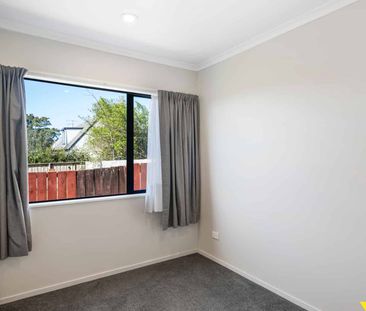 This beautifully renovated three-bedroom home in Ranui is ready for... - Photo 1