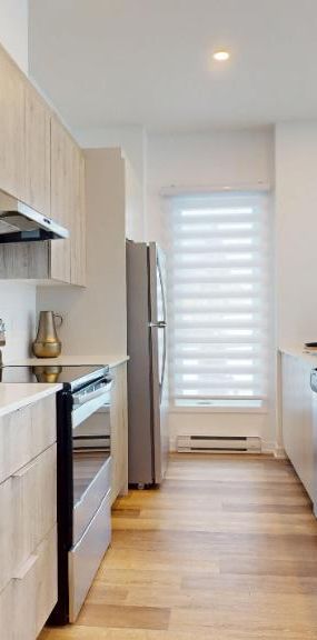 Magnifique 4 et demi dans LiveO Condos Locatifs Repentigny - appartement / logement à louer - Photo 1