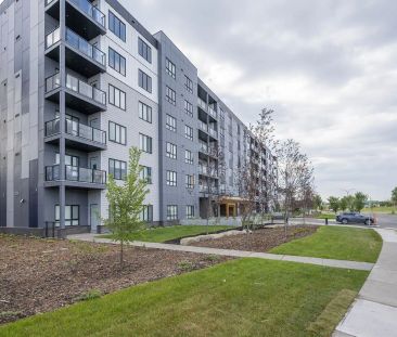 Elegant 1 bedroom Condo w/ 2 parking stalls — 1 Bedroom Condo Unit - Photo 1