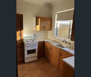 Two bedroom unit with secure garage and air conditioning - Photo 3