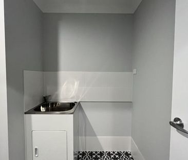 Stylish Modern Home with Ducted A/C & Water Included - Photo 4