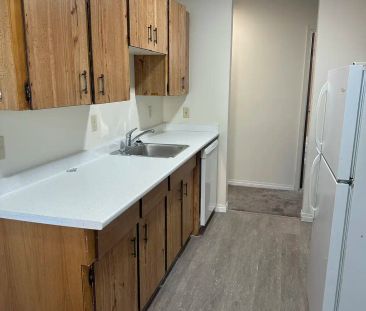 Surrey Manor - 11003 29A Avenue Northwest — 3 Bedroom - Photo 6