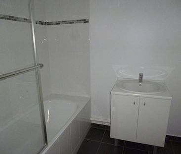 Location Appartement 3 pièces 71m² - Photo 3