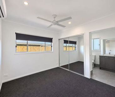 Modern 4-Bedroom Family Home with Double Garage in Greenbank - Photo 4