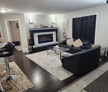 Furnished 2 Bed Legal Walkout Suite – Arbour Lake NW – $1,499 + Uti... - Photo 1