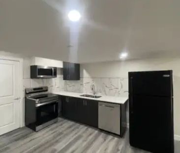 New, recently developed Walk-out basement suite with huge green spa... - Photo 1