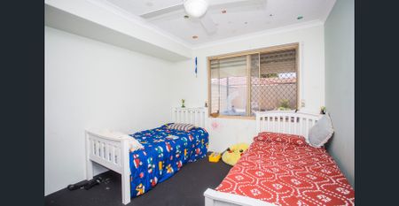 Impressive Family Living with Pool, Patio & Multiple Living Spaces - Photo 4