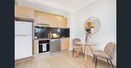 Perfectly Located One-Bedroom Apartment with Parking - Photo 2