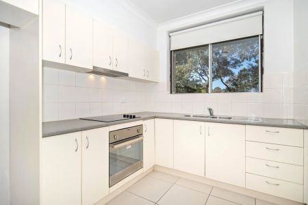 Spacious Two Bedroom Apartment with Parking in Ideal Location - Photo 3