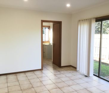 Spacious Unit In Lovely Garden Setting - Photo 1