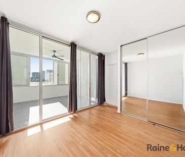 Spacious Dual-Level 2 Bed Apartment with Water Views & Resort-Style... - Photo 3