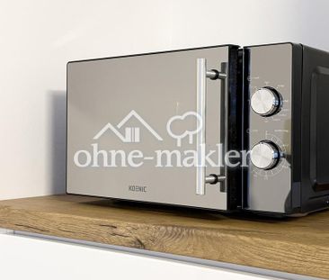 Erstbezug nach Sanierung – hochwertig möbliertes Apartment mit Tief... - Photo 6