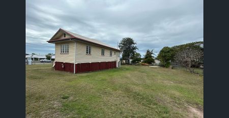 THIS BEAUTIFUL QUEENSLANDER IS AVAILABLE NOW - NEW FLOORING INSTALLED THROUGH OUT! - Photo 4