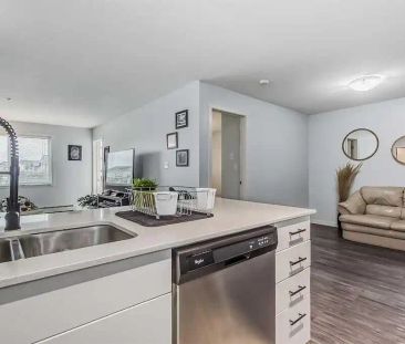 Spacious 2 Bedroom, 1 Bath, + Den + Balcony in Skyview Ranch! — 2 B... - Photo 1