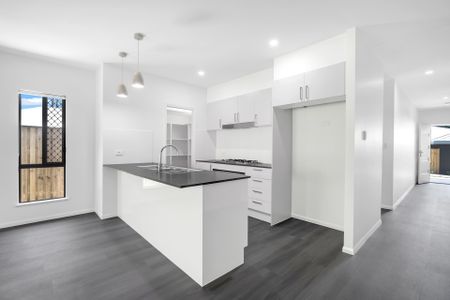 CUSTOM BUILT AND DESIGNED HOME WITH UPGRADED FINISHES! - Photo 2
