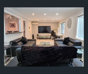 Family Home with Carport and Double Garage - Photo 2