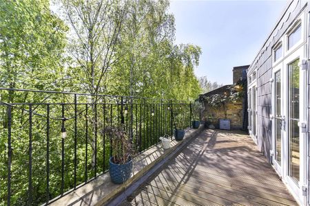 This beautifully recently refurbished 4 bedroom terraced house is arranged over three spacious levels, offering stylish modern living in a peaceful setting. - Photo 3