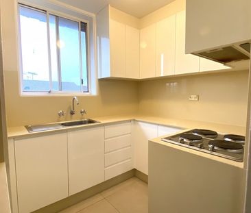 FANTASTIC TOP FLOOR UNIT 500M TO AUBURN STATION - Photo 6