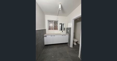 Freshly Renovated Coastal Unit with Italian Appliances in Prime Hamilton Hill - Photo 4