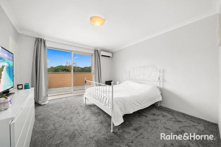 Experience Resort-Style Living in This Modern Dual-Level Apartment - Photo 5