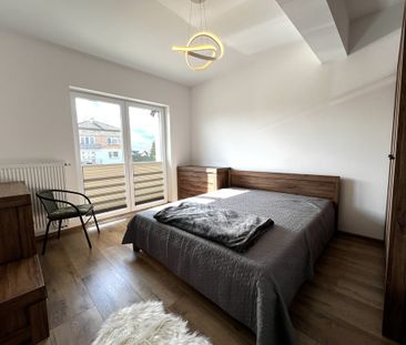 Komfortowy 2-poziomowy apartament na wynajem - Photo 3