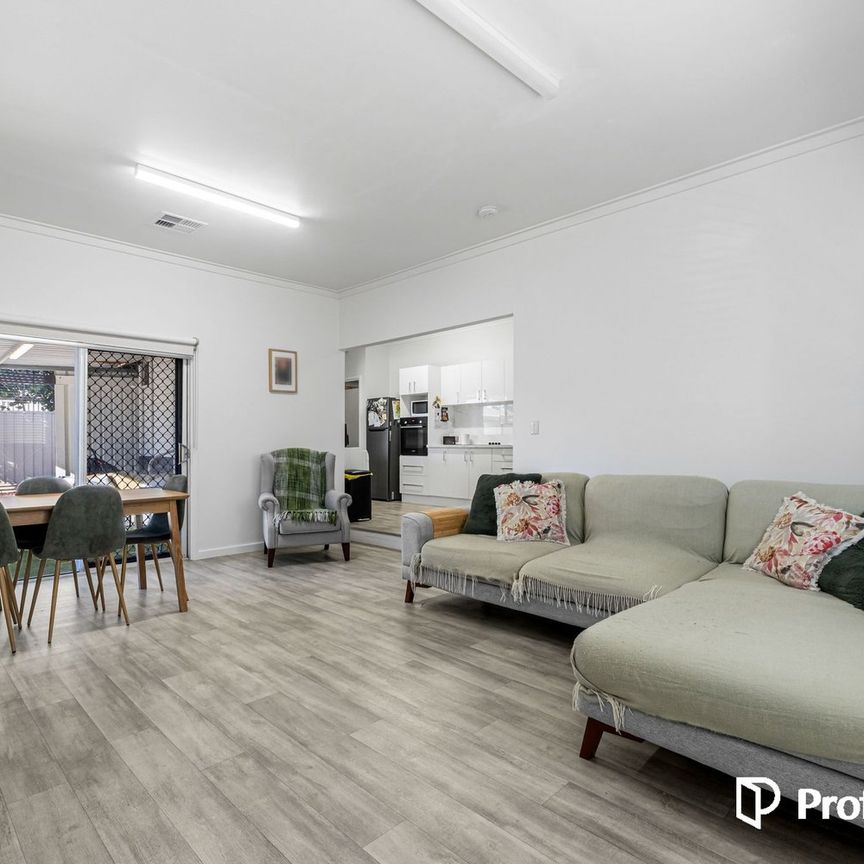 Lifestyle & Convenience in a Spacious Family Home - Photo 1