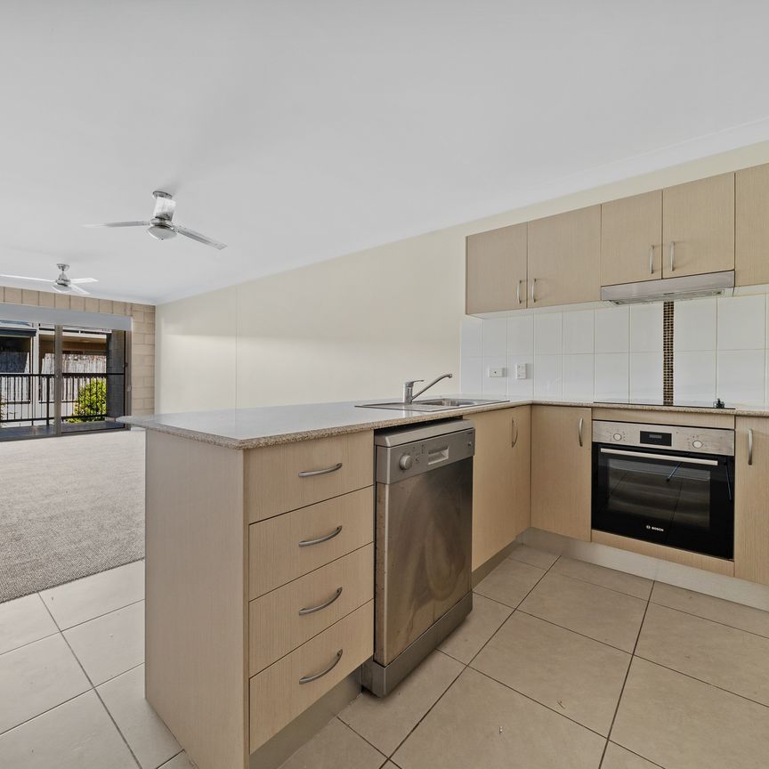 Stylish, Low-Maintenance Living in a Prime Location - Photo 1