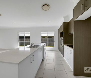 FOUR BEDROOM, FOUR BATHROOM WITH OUTDOOR PATIO AND SPACIOUS BACKYARD! - Photo 6