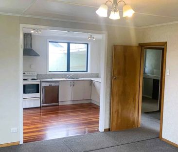 Warm, Welcoming & Walkable – Renovated Family Home Near Town - Photo 4