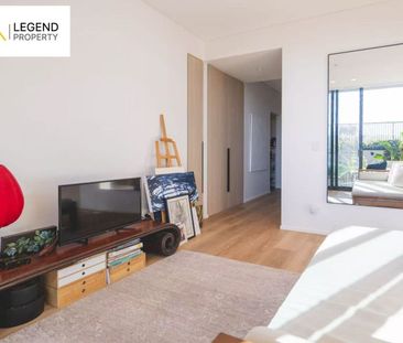 Stylish Modern Apartment with Oversized Study & Exceptional Upgrades - Photo 3