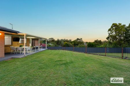 Spacious Family Home in Convenient Springwood Location - Photo 5