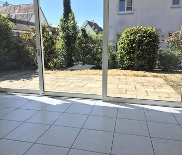 Familienfreundliche 3.5-ZWG mit Gartensitzplatz und Wintergarten - Photo 5